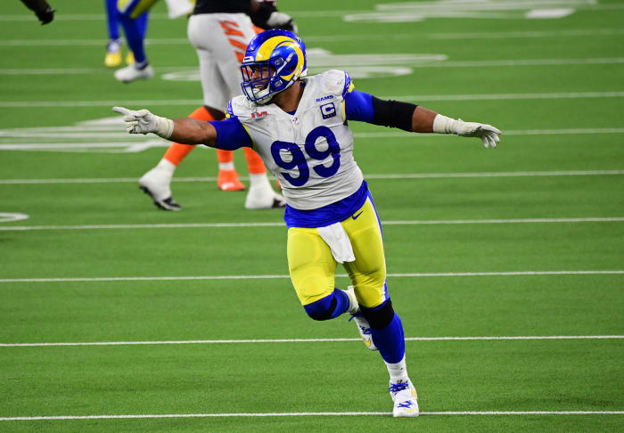 Feb 13, 2022; Inglewood, California, USA; Los Angeles Rams defensive tackle Aaron Donald (99) celebrates after a pressure in the fourth quarter against the Cincinnati Bengals in Super Bowl LVI at SoFi Stadium. Mandatory Credit: Gary A. Vasquez-USA TODAY Sports